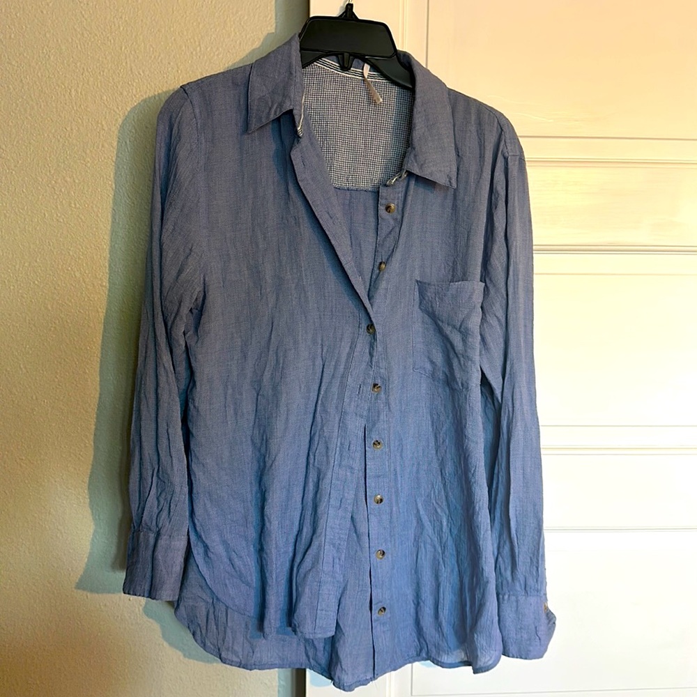 Clearly needs to be ironed. Worn once, cute free people button up.